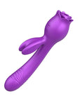 Plain side view of purple Rabbit Rose Toy showing the rose head, two front controls, short rabbit arm and long textured shaft