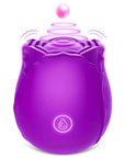Purple rose tapping stimulator with one front button and illustrated motion above the broad central pad