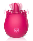 Pink nine-mode rose tongue vibrator with a projecting rounded tongue, layered petals and one front button marked with a droplet symbol