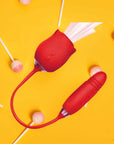 Red ribbed rose suction vibrator and connected textured lower arm on a yellow background
