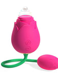 Pink Adult Rose Toy with two front buttons, a green flexible stem and a connected rosebud-shaped vibrating component