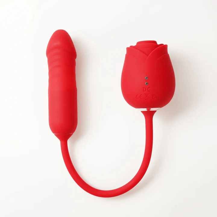 Rear view of the red connected rose toy showing the charging contacts