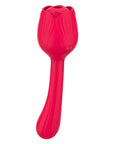 Rear view of the red Dora rose suction vibrator showing two magnetic charging contacts below the petals and a long curved stem