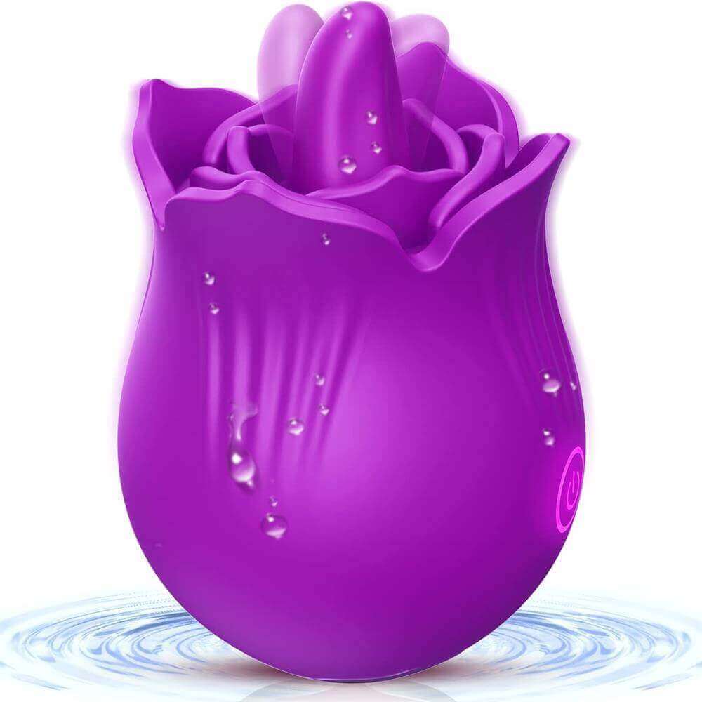 Purple Doreen rose tongue vibrator with a projecting central tongue, layered petal rim, single power button and decorative water droplets