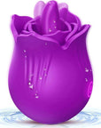 Purple Doreen rose tongue vibrator with a projecting central tongue, layered petal rim, single power button and decorative water droplets