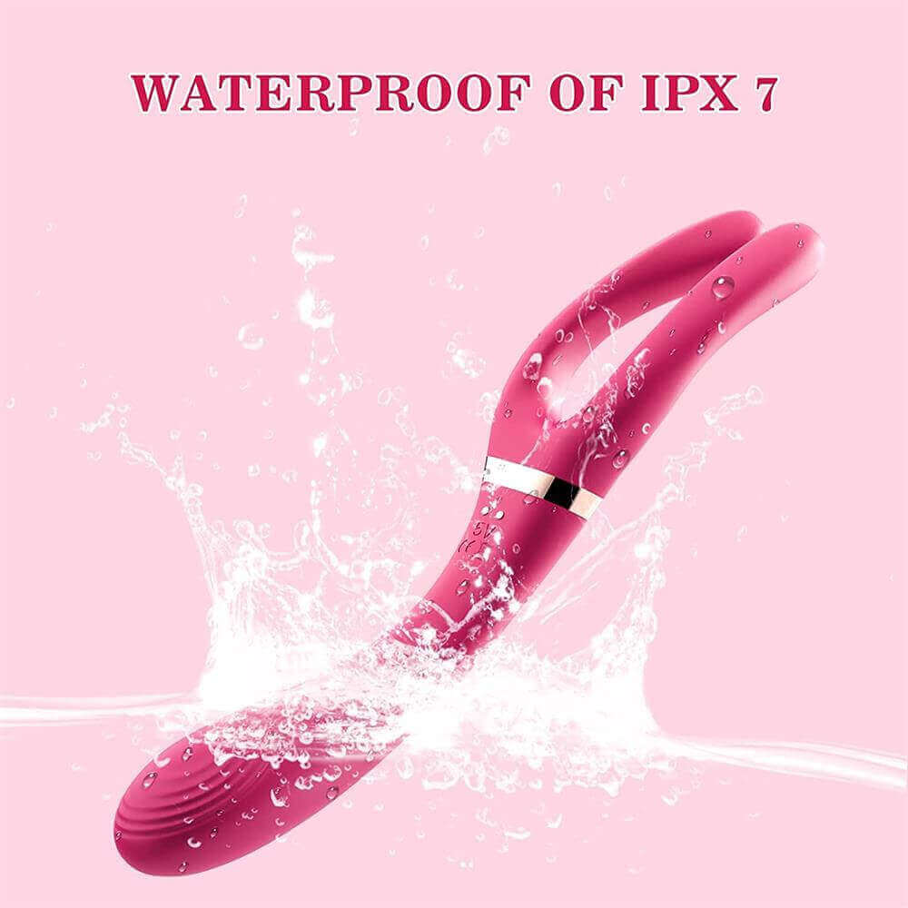 Wine red Elda vibrator pictured with a water splash and an IPX7 water-resistance label