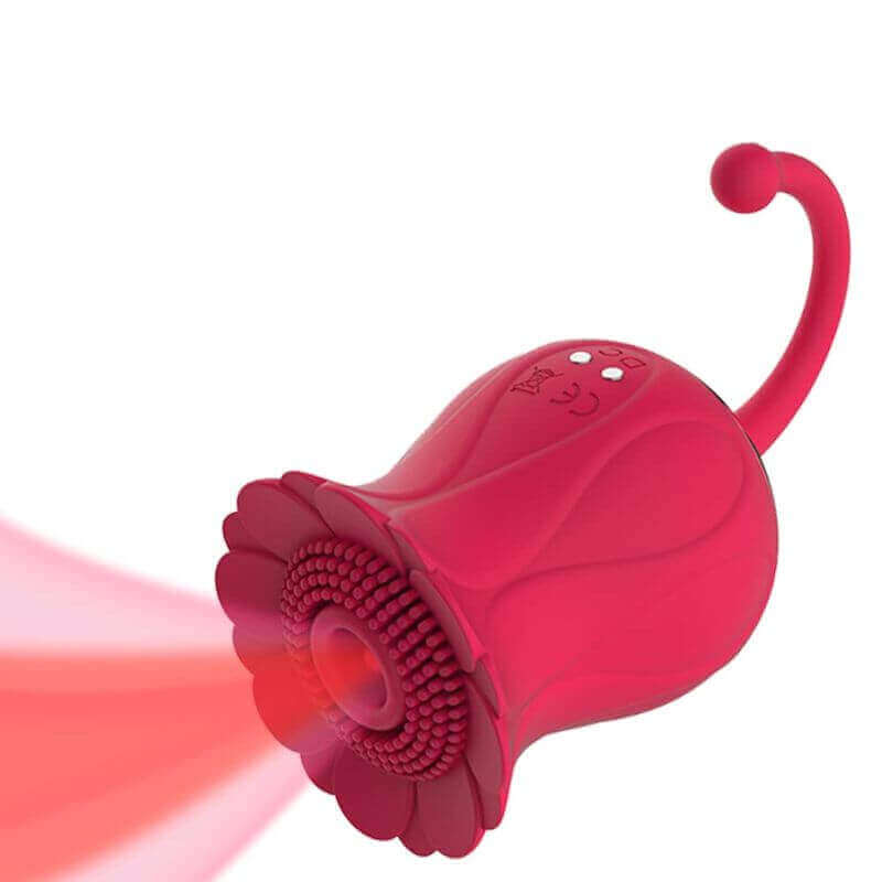 Red flower suction toy with textured contact rim, open center, two charging contacts and a curved rounded-tip tail