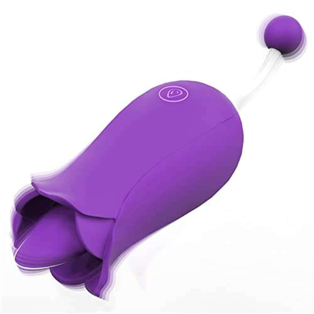 Purple flower tongue vibrator with a raised central tongue, one body button and a rounded bead tip on a narrow white stem