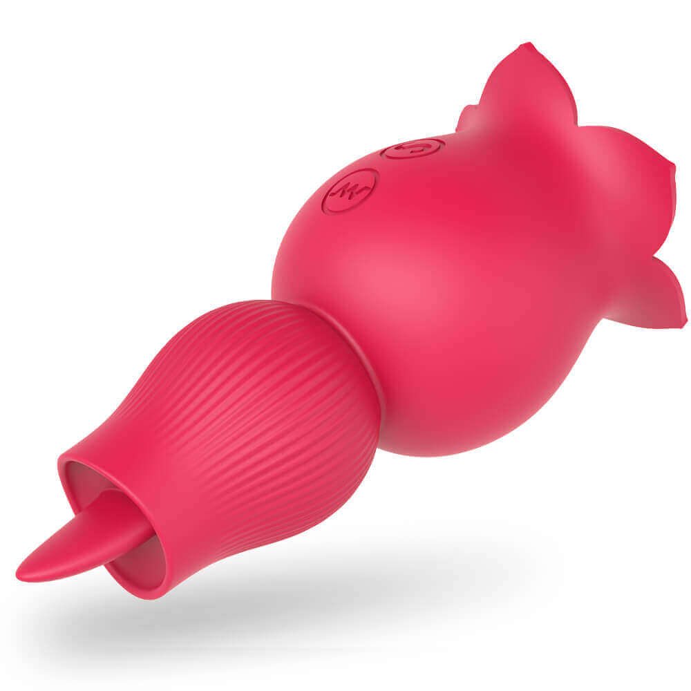 Angled view of the pink Holly rose vibrator showing the projecting tongue inside the ribbed opposite end and two buttons on the flower body