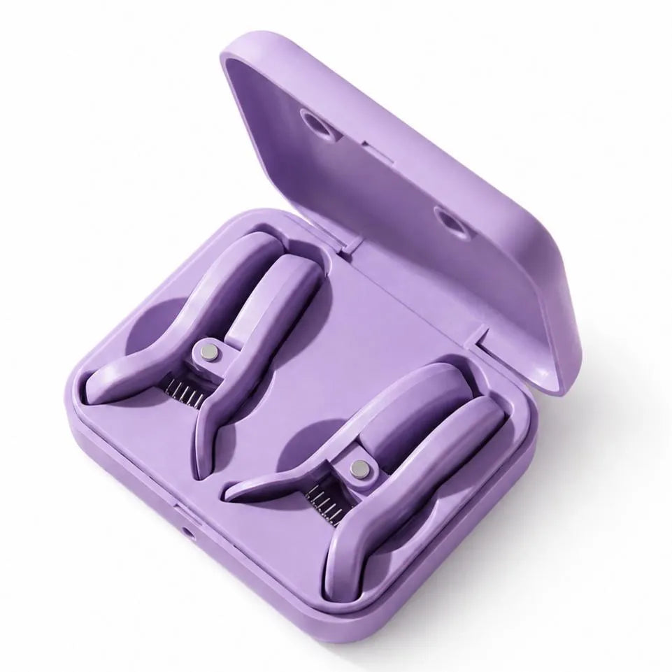Two purple clip-style nipple vibrators seated in an open matching charging case