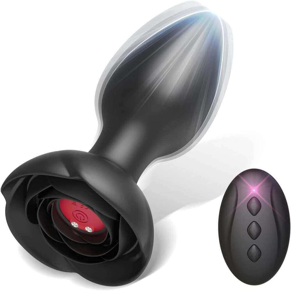 Black rose remote control vibrating plug with tapered bud, broad flower base and red underside panel beside a matching black three-button remote