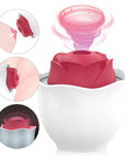 Red rose suction toy with open flower head seated in a white eggshell-shaped illuminated base