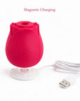 Red The Rose suction toy above its round two-contact magnetic USB charging dock