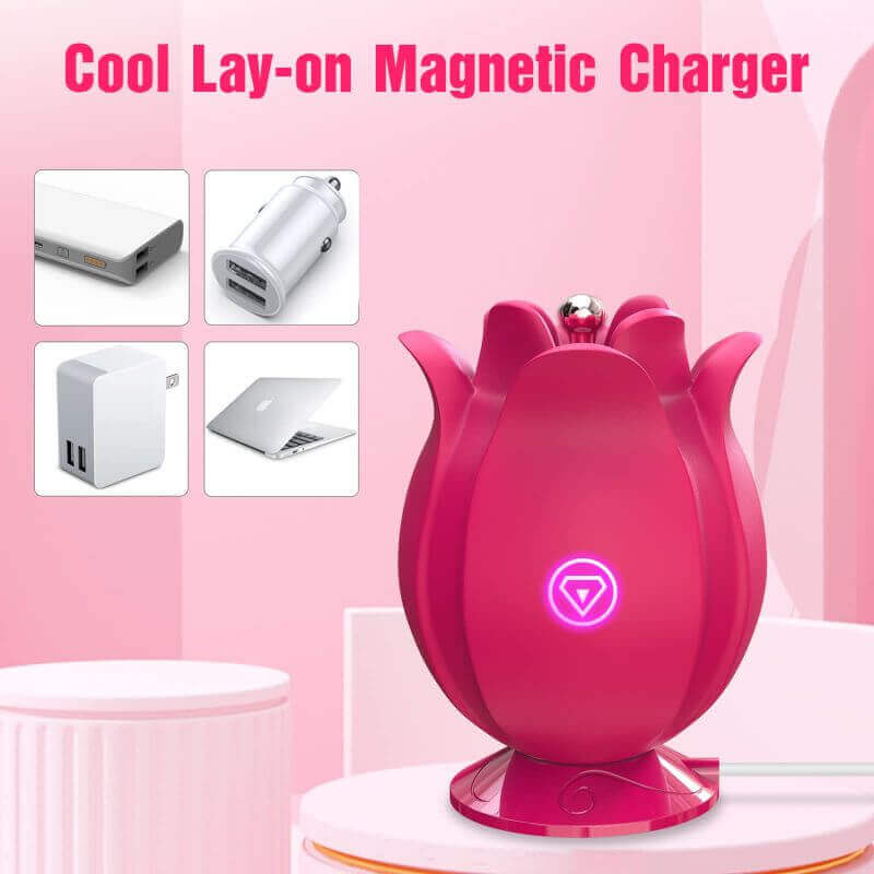 Pink rose massager standing on its magnetic charging base with USB power-source illustrations